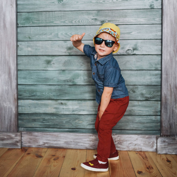 Happy little boy, a child in a Panama hat. - Fotó, kép