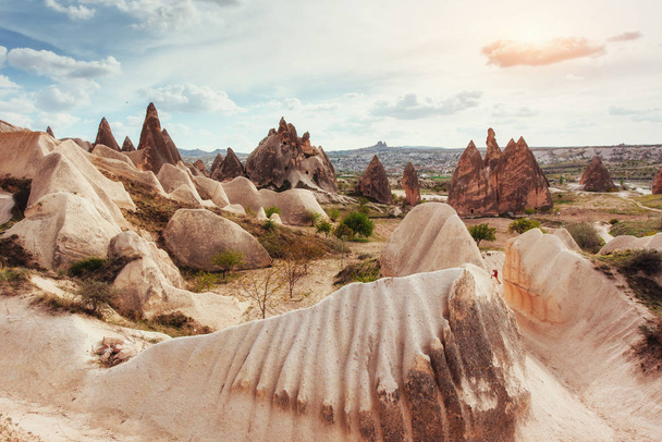 Beauty geological formations in Cappadocia, Turkey. Cappadocia with its valley, ravine, hills, located between the volcanic mountains in Goreme National Park. - Photo, image