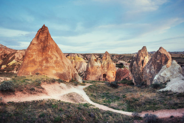 TUnique geological formations in valley in Cappadocia. - Фото, изображение
