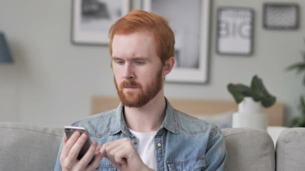 Man Using Smartphone for Online Financial Trading - Video, Çekim