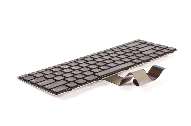 A substituição do teclado do laptop isolado no fundo branco
 - Foto, Imagem
