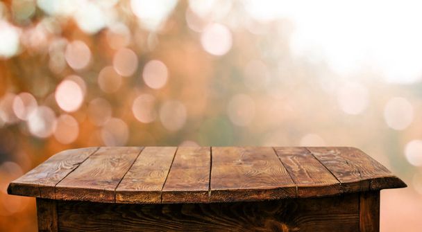 Empty wooden table with blurred natural background - Photo, Image