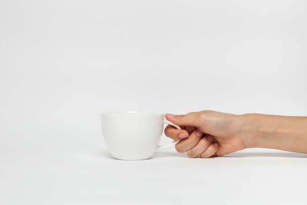 hand sign posture hold coffee cup in isolated - Fotoğraf, Görsel