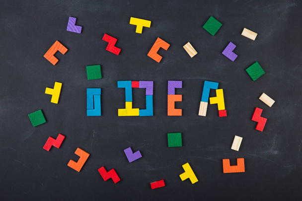Business creative Idea concept - inscription and jigsaw on the blackboard - 写真・画像