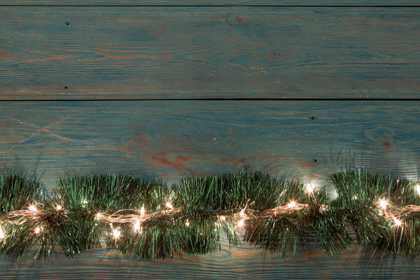 Christmas rustic background - vintage planked wood with lights and free text space - Photo, Image