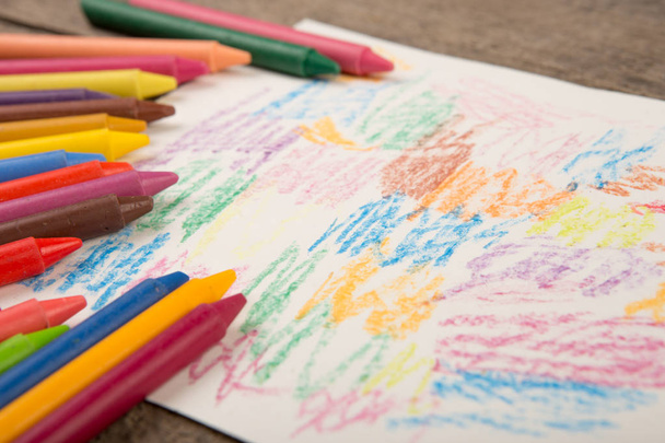 Crayons and paper on the desk - Fotografie, Obrázek