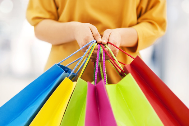 Woman holding shopping bags - Photo, Image