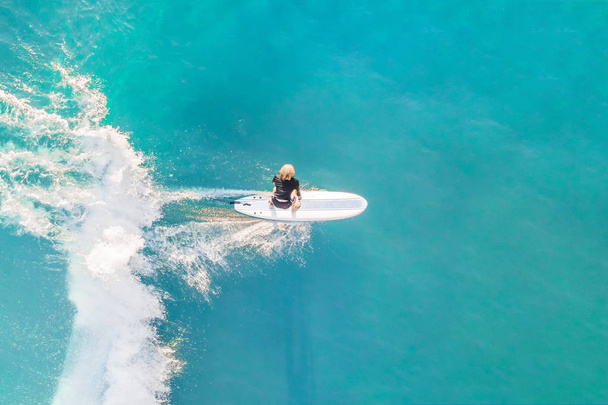 Surfer in the ocean, top view - Фото, зображення