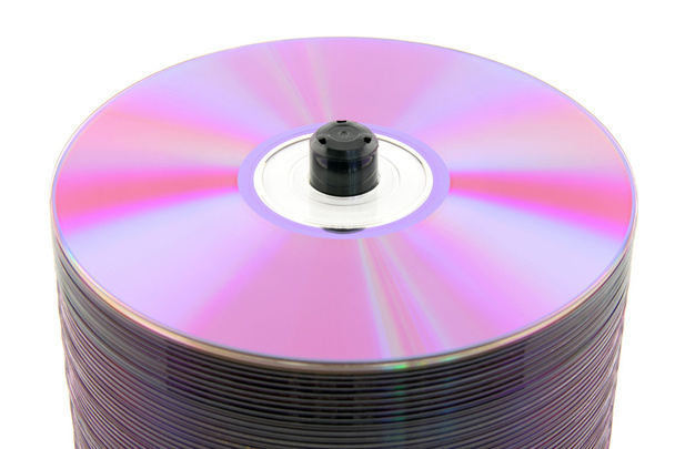 Close-up van paarse DVD's op spindel - Foto, afbeelding