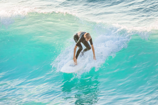 Bogliasco, Italy, October 6, 2017:  Surfer riding a wave - Zdjęcie, obraz