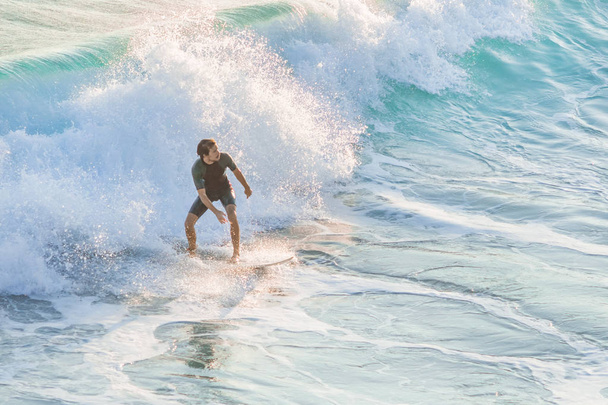 Bogliasco, Italy, October 6, 2017:  Surfer ride on a wave - Фото, изображение
