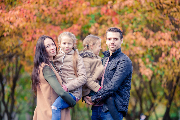 Portrait of happy family of four in autumn day - Foto, Imagem