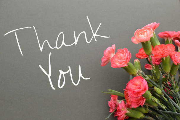 Thank You text on chalkboard and flowers  - Photo, Image