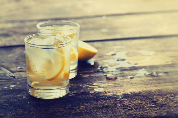 two glasses with lemonade on wooden table - Foto, Imagem