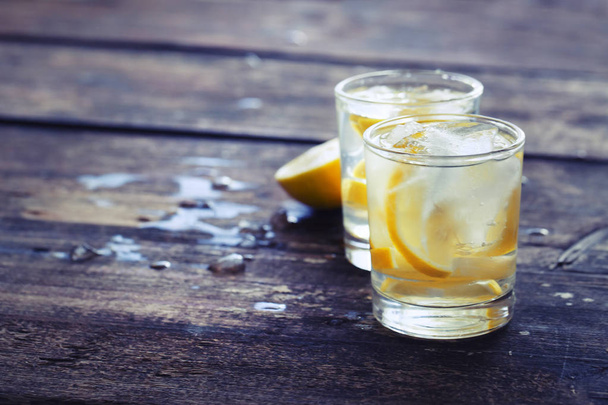 two glasses with lemonade on wooden table - Foto, Imagem