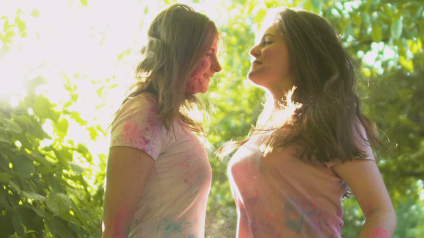 Beautiful students dancing in colorful clouds of dust, happy, young and free - Séquence, vidéo