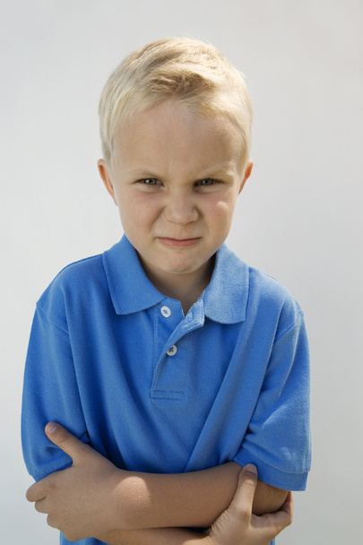 Young Boy Glaring - Foto, afbeelding