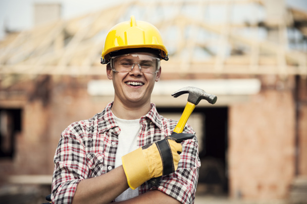 Construction worker with hammer - Zdjęcie, obraz