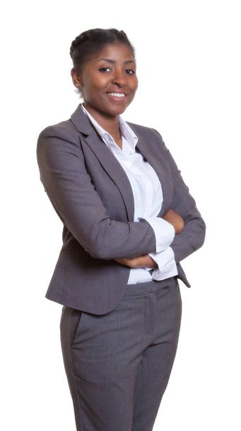 Attractive businesswoman from Africa with crossed arms on an isolated wihte background for cut out - Foto, Imagen