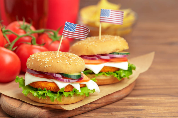 Fast food, homemade burgers on a wooden background - Photo, Image