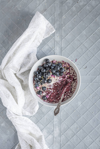 Purple Acai Smoothie Bowl with Hands - Photo, Image