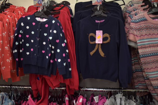 Russia, St. Petersburg 27,12,2015 Women's and children's clothing in the supermarket - Foto, Bild