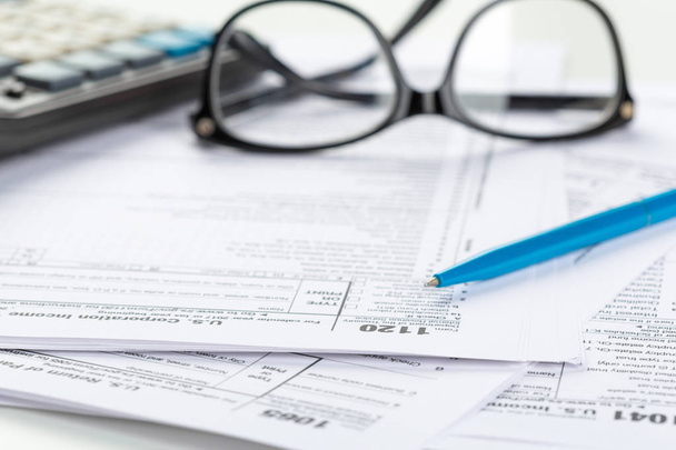 close-up of tax forms, business accessories - Φωτογραφία, εικόνα