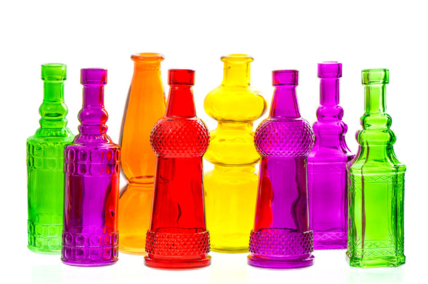 colorful empty transparent glass bottles - Фото, изображение