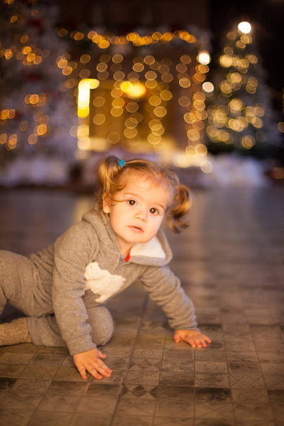 beautiful baby on christmas decorated room - Photo, Image