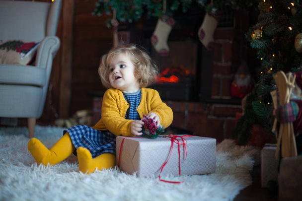 beautiful baby on christmas decorated room - Foto, immagini