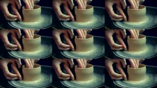 Workshop molding of clay on potters wheel. Dirty hands in the clay - Footage, Video