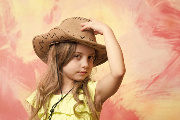 cowboy hat on adorable girl wearing american outfit - Fotó, kép