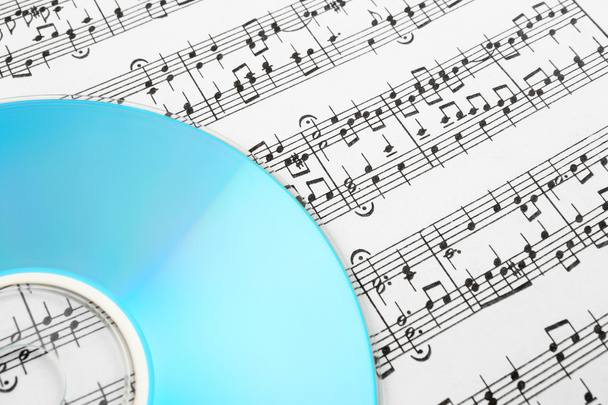 Синій компакт-диск і музичні ноти
 - Фото, зображення