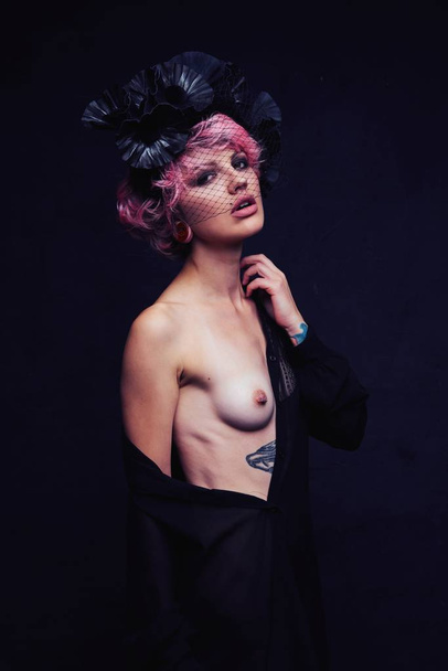 Beautiful Portrait of woman with pink hair  and tattoo         - Foto, afbeelding