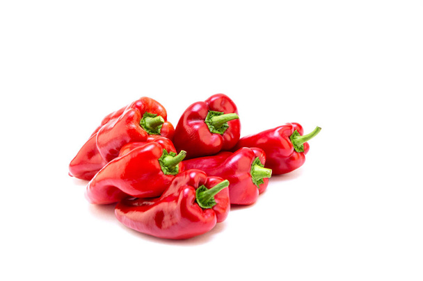 Red pepper on white background. Natural farm product. Image for cafe advertising, food. - Photo, Image