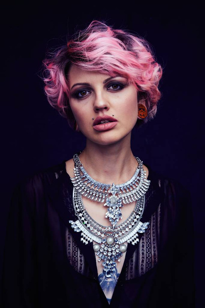 Beautiful Portrait of woman with pink hair  and necklace - 写真・画像