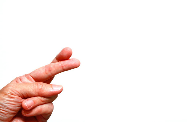 image de croisement des doigts sur fond blanc avec espace de copie
 - Photo, image