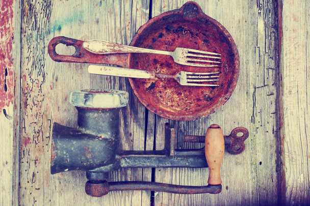 vintage kitchen utensil on rustic wooden background - Fotó, kép