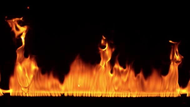 Super slow motion of fire line isolated on black background. Filmed on high speed camera, 1000 fps - Footage, Video