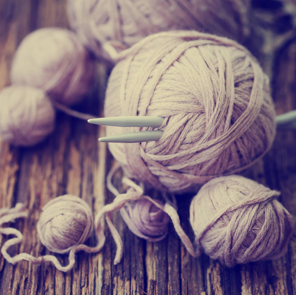 closeup view of knitting needles and yarn over wooden table - Valokuva, kuva