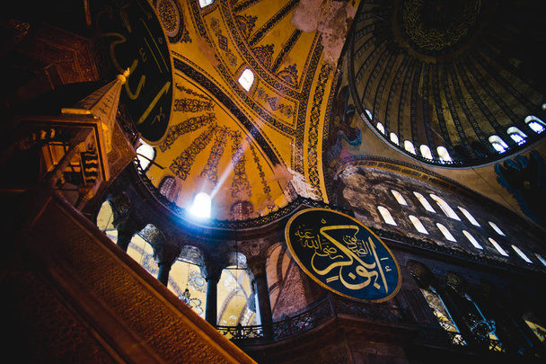 Istanbul, Turkey - April 5, 2012: Interior of the historic Basilica of Saint Sophia, mosque for the most visited Muslim cult in Istanbul. - Foto, Imagem
