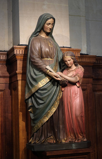 Statue of Saint Anne and Virgin Mary by Peaucelle Coquet, 19th century, Chapel of the Sacred Heart in the St Francis Xavier's Church in Paris, France  - Photo, Image