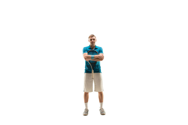 one caucasian man as tennis player posing isolated on white background - Zdjęcie, obraz