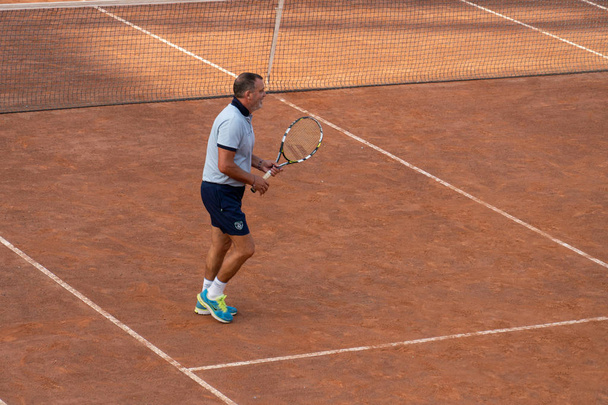 Rome, Italy - September 4, 2018: Marco Tardelli playing tennis. Tardelli is an Italian former football player and manager. At club level, he played as a defensive midfielder for several Italian clubs - Photo, Image