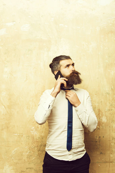 businessman or bearded man with long beard speaking on phone - Fotoğraf, Görsel
