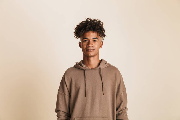 Portrait of a young afro american man dressed in hoodie isolated - Fotoğraf, Görsel