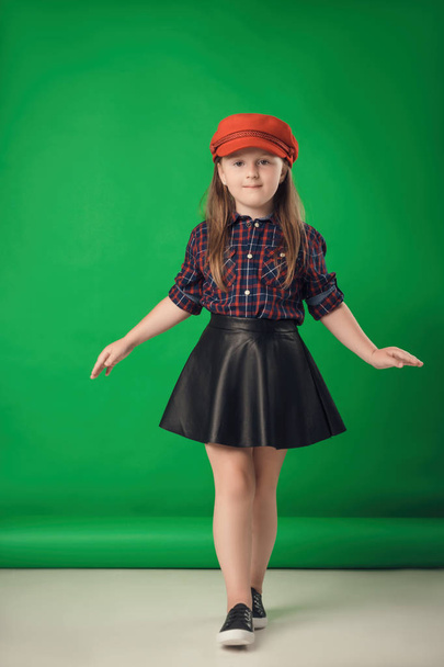 child in the Studio posing in fashionable clothes - Φωτογραφία, εικόνα