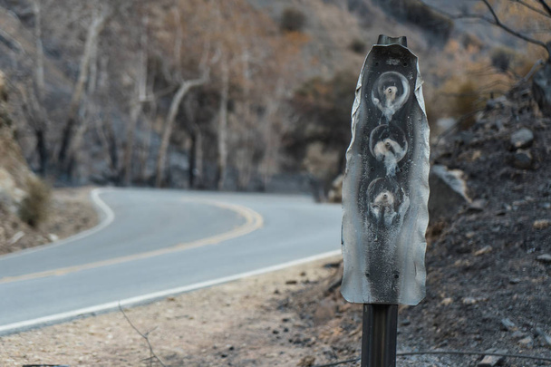 Road and highway signs damaged by the Thomas Fire along Highway 33 in Ojai, California - Photo, Image