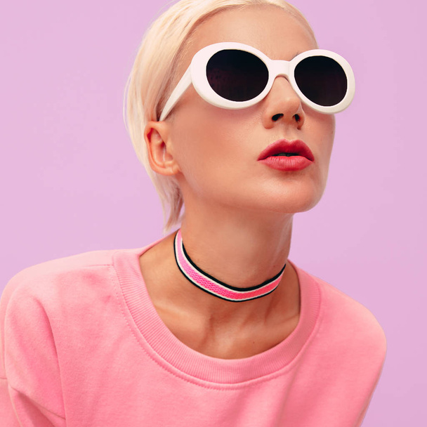 Stylish girl in fashion accessories. Sunglasses and choker. Pink fashion vibes - Photo, Image