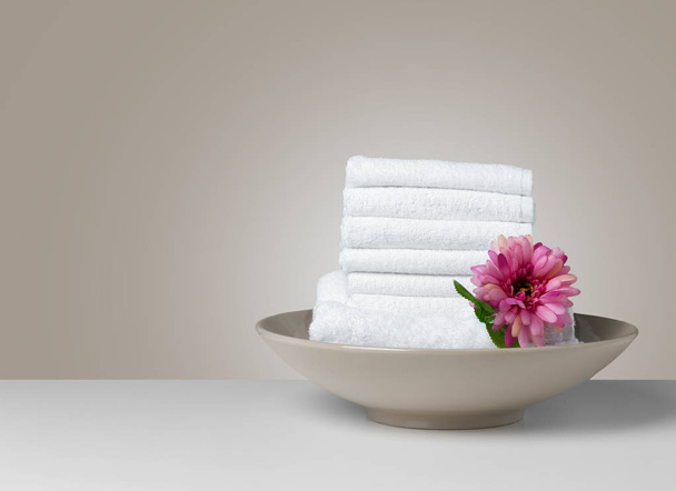 Stack of folded white spa towels - Foto, immagini